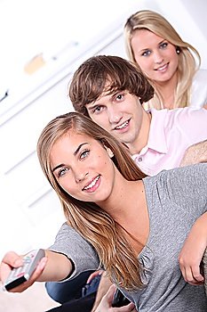 Three teenager sat at home