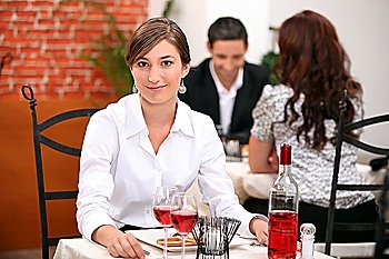 Young woman on a date in a restaurant