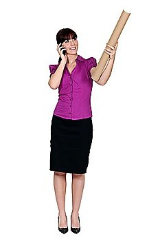 Woman on the phone and holding a cardboard mailing tube