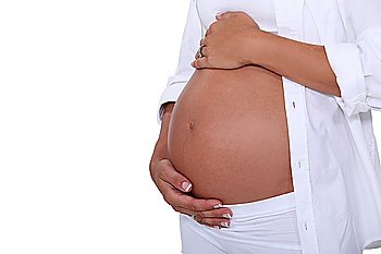 Pregnant woman holding her tummy