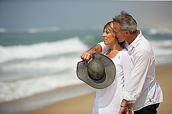 happy couple on the beach