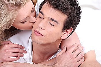 Woman kissing her boyfriend