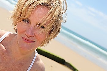 Blond woman at the beach