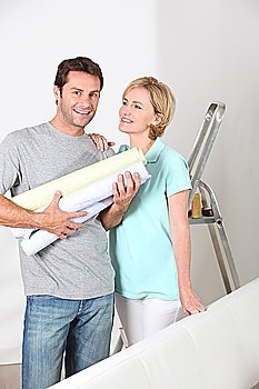 portrait of a couple with wallpaper