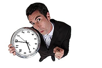 High-angle shot of a businessman holding a clock