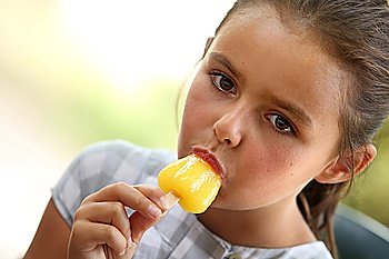 Little girl with ice lolly