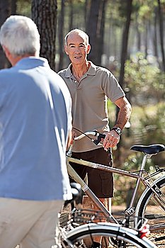 Grey haired man on bike ride