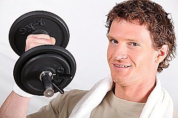 Man working out with a 2kg dumbbell