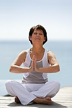 senior woman meditating
