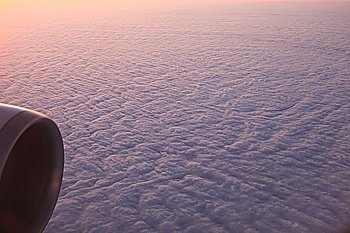 Aeroplane engine above the clouds