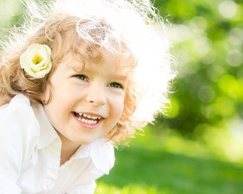 Portrait of happy child in spring