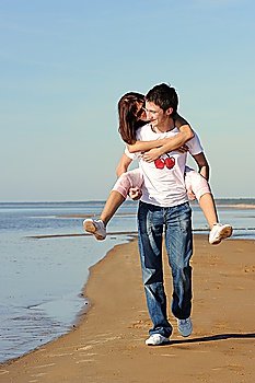 Young couple in love on the beach