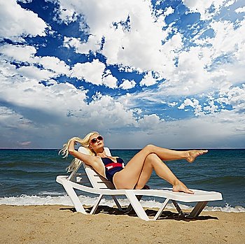 Blond woman relaxing in the sea