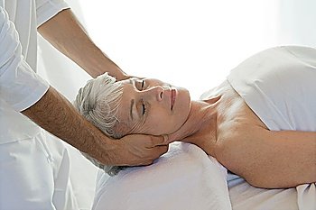 Senior woman having massage