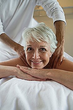 Portrait of senior woman having massage