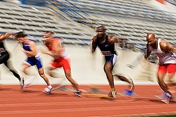 Runners running on a track