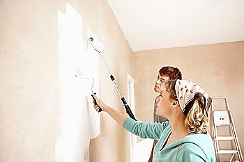 Couple Painting Room Together