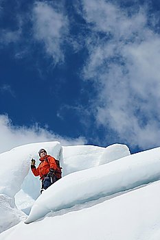Hiker standing on ice chunks