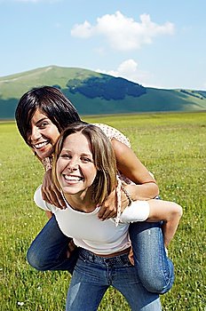 Two Young Women in Meadow