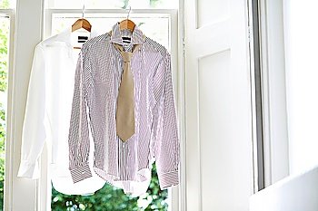 Two Dress Shirts on Hangers