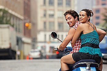 Couple on Motor Scooter