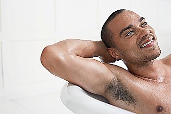 Man Relaxing in Bathtub