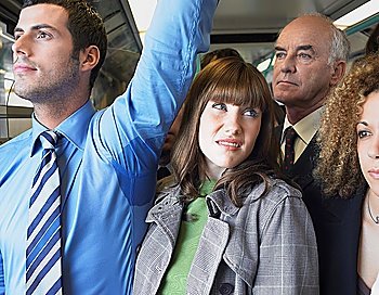 Commuter Standing by Man´s Wet Armpit on Train