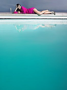 Woman Lying Near a Pool