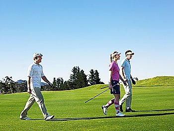 Golfers Walking on Course