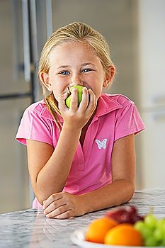 Little Girl Eating an Apple