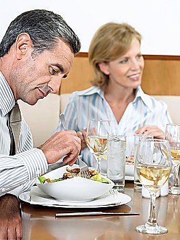 Businesspeople Eating at Restaurant