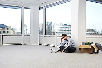 Businessman in Empty Office Space