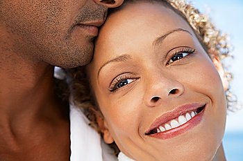 Man and woman embracing close up of woman´s face