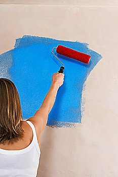 Woman Painting Wall