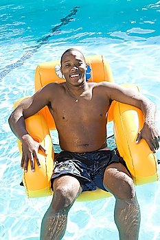 Portrait of Young Man on Inflatable Chair
