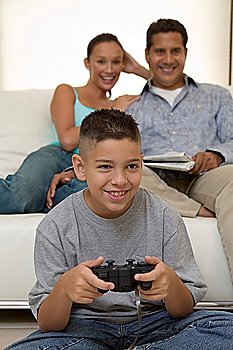 Parents Watching Son Play Video Games