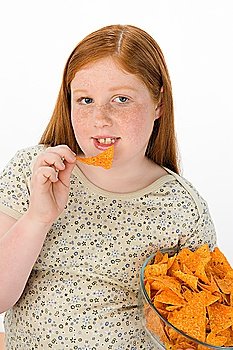 Overweight girl eating potato chips