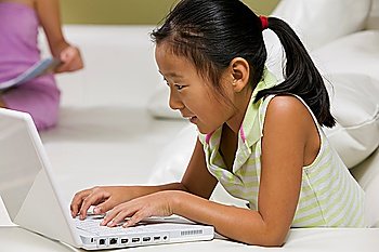 Young Girl Using Laptop