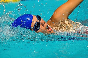 Woman Swimming and Coming Up for Air