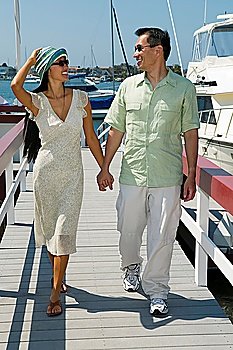 Happy Couple Walking on Dock