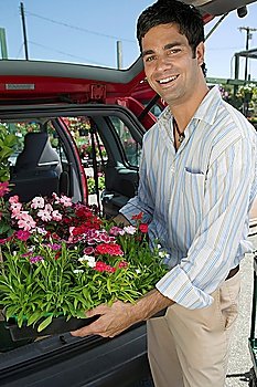 Man Loading Flowers into Van
