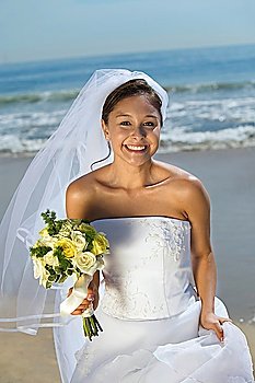 Happy Bride on Beach With Bouquet