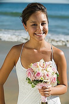 Bride on Beach With Bouquet