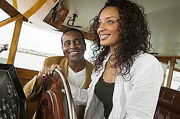 Couple Driving Yacht