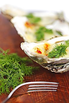 Oysters under cheese and dill