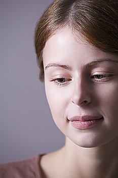 Pensive young woman, close-up