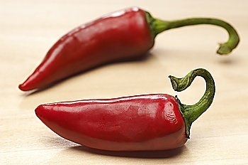 Two red chili peppers, close-up