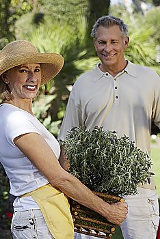 Man and woman gardening