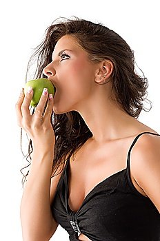 pretty and sensual brunette biting a green apple