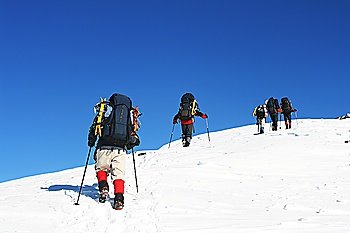 Hike in winter mountain